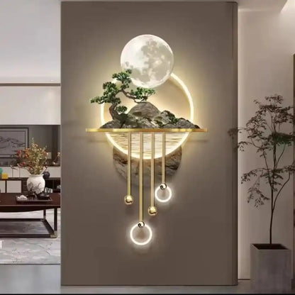 Decorative wall light fixture with moon and rock design in a modern interior setting.